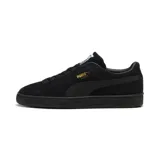 Championes urbanos Puma modelo Suede Classic, color negro total, confeccionados en gamuza con suela de goma y detalle de logo dorado en el lateral.