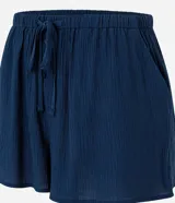 Short de playa color beige, confeccionado en viscosa y poliamida, con diseño holgado, bolsillos laterales, cintura elástica con cordón de ajuste tipo lazo y detalle de botones frontales.