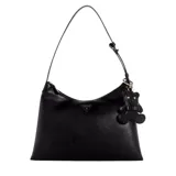 Cartera tipo hobo Guess modelo Kassie, color negro, con cierre superior y correa de hombro ajustable. Presenta un logo metálico triangular en el frente y un dije colgante en forma de oso.