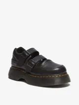 Zapato Mary Jane negro de cuero Milled Nappa, con dos correas ajustables con hebillas, cuello acolchado y una suela inflada de PVC con costura amarilla.