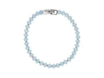 Pulsera de acero plateado con circonias color agua marina.