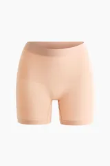 Culotte de tiro alto color nude con leve efecto moldeador en cintura, muslos y glúteos. Diseño sin costuras y refuerzo interior.
