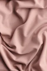 Body de manga larga confeccionado en punto elástico color rosado, con diseño colaless, escote cuadrado y cierre con botones a presión en la parte inferior.