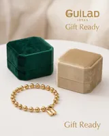 Pulsera de acero italiano con baño de oro, compuesta por una cadena de eslabones tipo bolitas y un dije central en forma de candado.