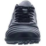 Championes de fútbol 5 Umbro modelo Touch TF, con suela de goma diseñada para césped sintético. Presentan un diseño clásico con el logo de la marca en el lateral y cierre mediante cordones.
