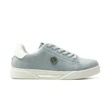 Championes urbanos Korium modelo Alida, color celeste con detalles en blanco y suela de goma blanca. Presenta cordones al tono, aplique lateral con el logo de la marca en círculo y refuerzo en el talón.