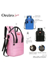 Mochila matera color azul, con diseño acolchado, doble asa superior y correas ajustables. Cuenta con cierre frontal y etiqueta de la marca en el centro.