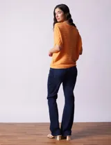 Buzo azul de tejido acanalado marca Ninety, con mangas cortas japonesas.