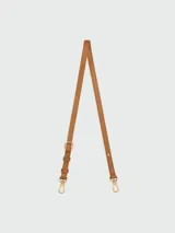 Correa de hombro ajustable para cartera Longchamp, confeccionada en cuero color tostado con herrajes metálicos dorados.