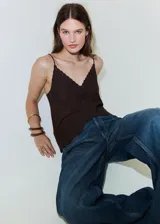 Jeans Orlando de corte wide leg y tiro medio, en tono azul clásico con efecto desgastado.