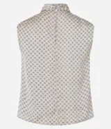 Blusa sin mangas de poliéster satinado color beige con estampado geométrico y cuello alto drapeado.