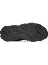 Championes de running Under Armour modelo Halo Runner, color negro. Presentan una parte superior de malla técnica para un ajuste dinámico y ligero, con amortiguación reactiva UA HOVR+ en la entresuela para mayor retorno de energía y estabilidad. Suela exterior de goma duradera diseñada para tracción y rebote.