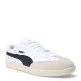 Championes urbanos Puma modelo 9T, con diseño de inspiración deportiva. Presentan una capellada blanca con franja lateral característica en negro, puntera reforzada en gamuza color beige y suela de goma en tono crema.