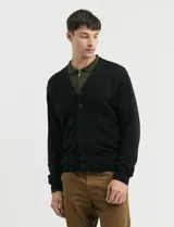 Cardigan de punto con escote en V, cierre frontal con botones, manga larga y detalles de tejido menguado en las sisas.