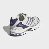 Championes Adidas Adistar Control 3 de running, color blanco con detalles plateados y violetas. Cuentan con exterior de malla y refuerzos sintéticos, estructura de TPU y suela de caucho.