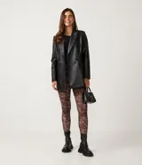 Pantalón legging de malla con cintura alta y estampado floral.