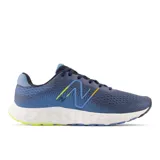 Championes New Balance 520v8 azules con detalles en amarillo y blanco.