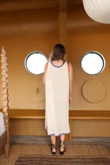 Vestido largo tejido en hilo de algodón con calado, color negro con detalles en celeste y naranja.