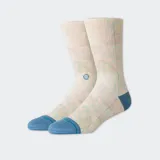 Medias Stance de caña alta con diseño geométrico multicolor y puntera azul.