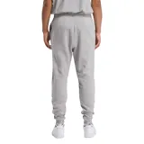 Jogger deportivo Reebok para hombre, color gris melange, confeccionado en tejido polar cepillado en el interior. Presenta cintura elástica con cordón ajustable y el logo Vector de Reebok bordado en la pierna.