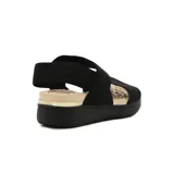 Sandalias de plataforma Modare para mujer, color negro con tiras elásticas acanaladas y plantilla texturizada en tono tostado.