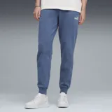 Pantalón de jogging Puma, color azul, con cintura elástica, puños acanalados en los tobillos y logo de la marca estampado en blanco en la pierna izquierda.