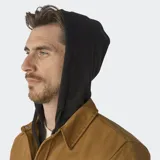 Campera marrón con capucha negra, cierre frontal con cremallera y botones a presión, bolsillos en el pecho y bolsillos calientamanos. Forro acolchado de tafetán y logo de Dickies Skateboarding en el pecho.