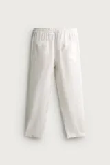 Pantalón relaxed fit de lino color negro, con cintura elástica ajustable con cordón y bolsillos frontales.
