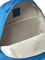 Mochila azul de poliéster con múltiples compartimentos, correas acolchadas y logo gráfico de Calvin Klein en la parte frontal.