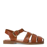 Sandalias franciscanas de cuero negro con tiras cruzadas, suela plana y hebilla metálica dorada lateral.