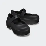 Zuecos Crocs Stomp Mary Jane color negro, con plataforma exagerada y correa ajustable con orificios para charms Jibbitz™.