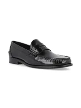 Mocasines de vestir tipo penny loafer en color negro, confeccionados en cuero con acabado brillante. Presentan costuras reforzadas en el empeine y suela de goma con pequeño tacón.