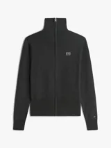 Cardigan de punto gris oscuro con cierre frontal de cremallera, cuello alto y mangas largas. Presenta puños y dobladillo acanalados, y el logo bordado de Tommy Hilfiger en el pecho.