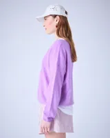 Suéter de cashmere cepillada con cuello en V, corte oversize, mangas largas y acabados acanalados.