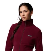 Campera polar Columbia con cierre frontal completo, cuello alto y bolsillos laterales con cierre. Presenta un diseño entallado y logo de la marca en el pecho.