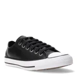 Championes Converse All Star Chuck Taylor de cuero negro con suela de goma blanca.