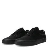 Championes Vans modelo Old Skool, color negro, con diseño clásico de lona y cuero, suela de goma tipo waffle y cierre con cordones.