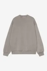 Buzo Carhartt WIP modelo Nelson Sweat, color gris con efecto acid wash, cuello redondo, mangas largas y parche con el logo de la marca en el pecho.