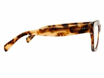 Armazón de receta con diseño geométrico de gran tamaño, fabricado en bio acetato con estampado carey claro.