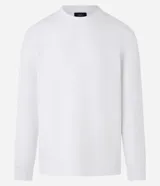 Remera de manga larga con cuello redondo y textura, de corte regular. Confeccionada en una mezcla de algodón, poliéster y viscosa.