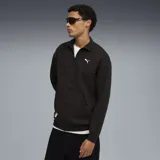 Campera deportiva Puma con cierre frontal completo, cuello alto y bolsillos laterales. Presenta una textura tipo waffle en el cuerpo y mangas, con el logo de la marca bordado en el pecho.