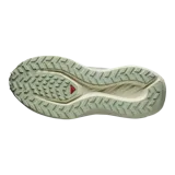 Championes de trail running Salomon DRX Defy Grvl, color negro con detalles en naranja y entresuela verde menta, diseñados con soporte y ligereza para correr en caminos de grava y asfalto.