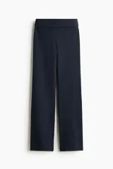 Pantalón de punto de algodón suave, color azul marino, con cintura ancha plegable y piernas rectas con bajo acampanado.