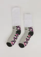 Medias grises con diseño de ladrillos en tonos rosa y violeta, con puño blanco de felpa.