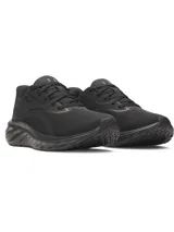 Championes de running Under Armour modelo Ascend, color negro. Presentan una parte superior de malla transpirable con refuerzos en el mediopié, entresuela Charged+ Cushioning para mayor amortiguación y suela de goma resistente.