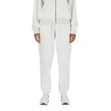 Pantalón de jogging gris melange de tejido French Terry, con corte holgado, bolsillos diagonales y logo bordado.