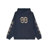 Hoodie oversize color azul marino con estampado frontal de logo doble B y detalles de símbolos de Bitcoin en ambas mangas.