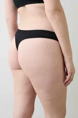 Colaless negro de microfibra seamless con punto rib y fundillo de algodón.