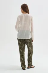 Babucha de viscosa con estampado floral en tonos marrones y beige, de corte recto y ajuste cómodo.
