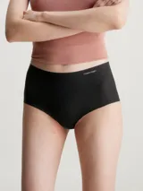 Bombacha hipster de cintura alta Calvin Klein Invisibles, color negro, sin costuras y con logo de la marca en la cintura.